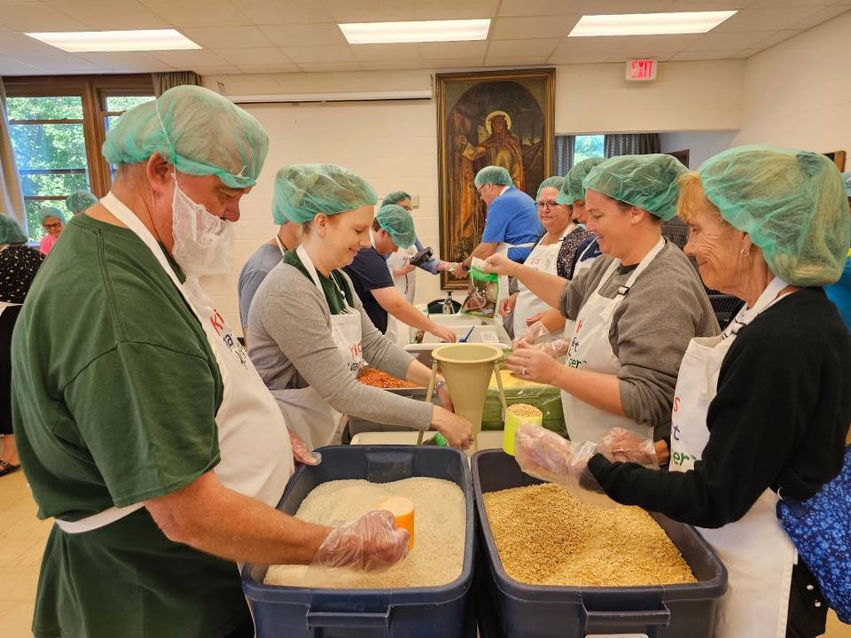 Serving with Kids Against Hunger